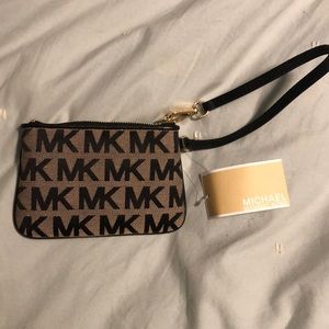 Small SIG Michael Kors Wristlet in black